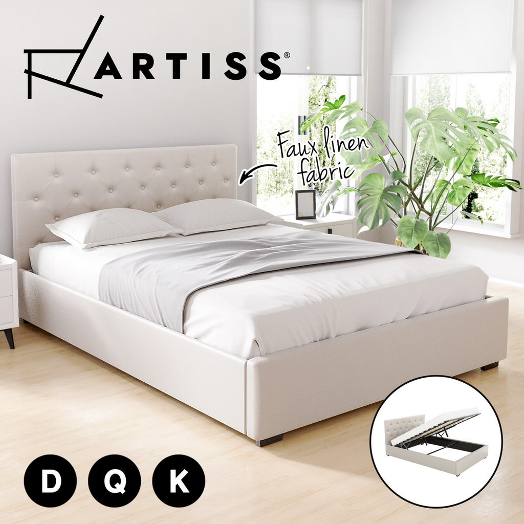 White upholstered bed with tufted headboard in a bright room with plants, featuring the Artiss brand.